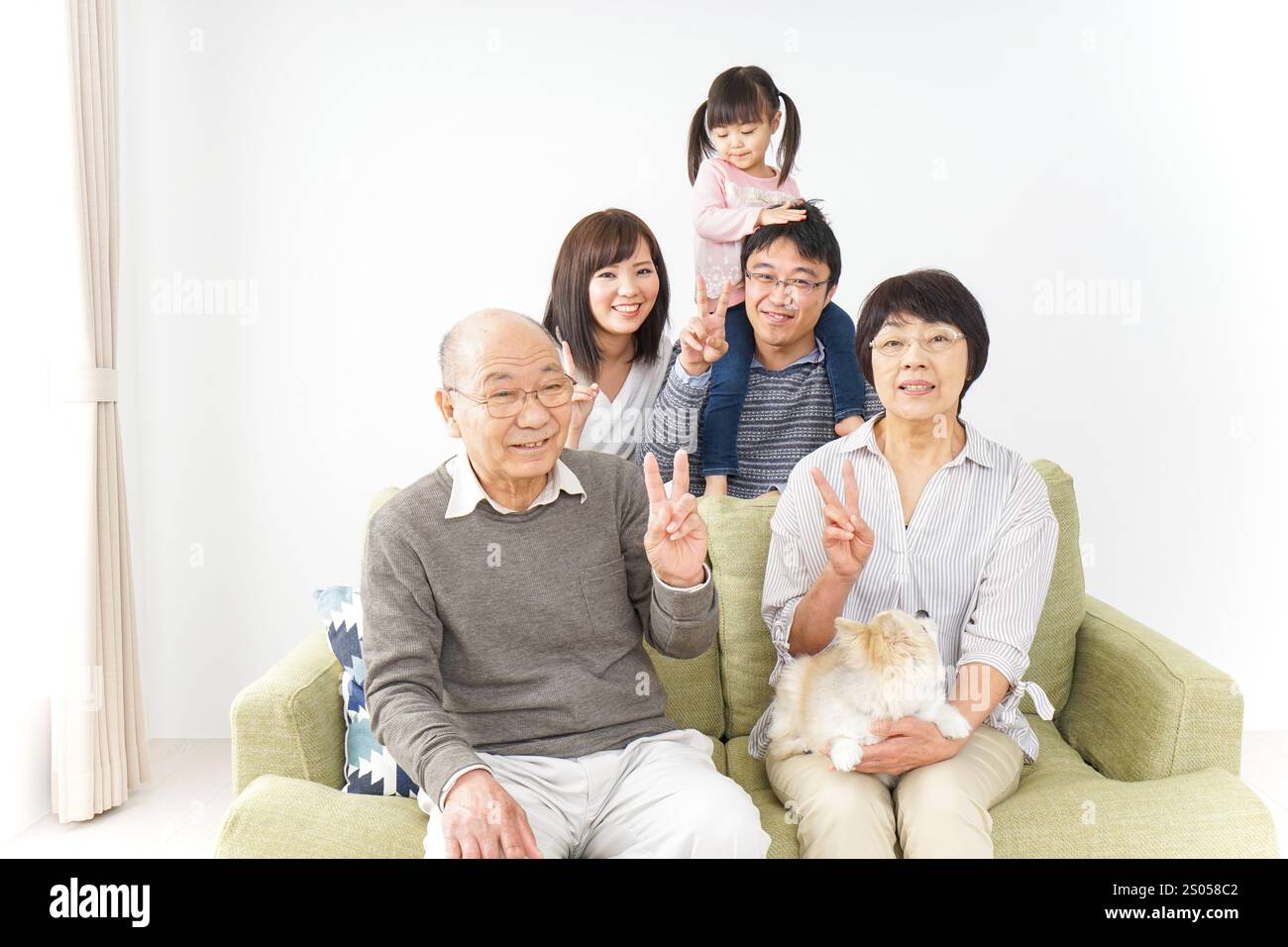 Image photo de groupe familial de trois générations Banque D'Images