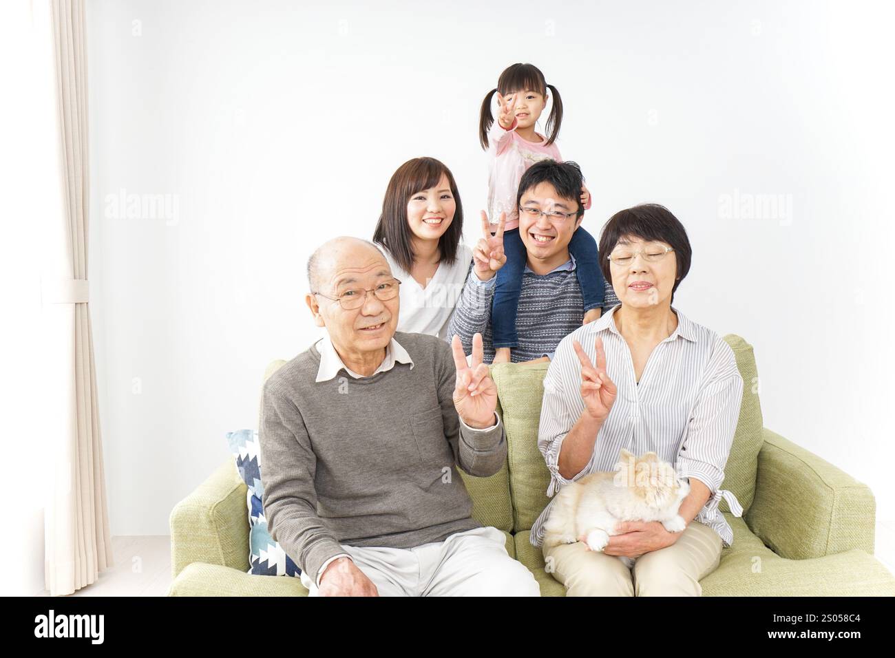 Image photo de groupe familial de trois générations Banque D'Images