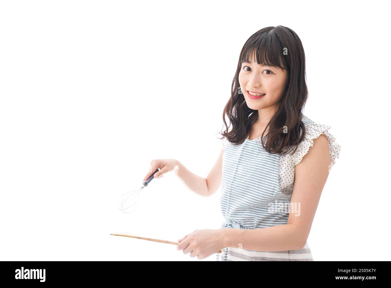 Jeune femme avec des grains de café Banque D'Images