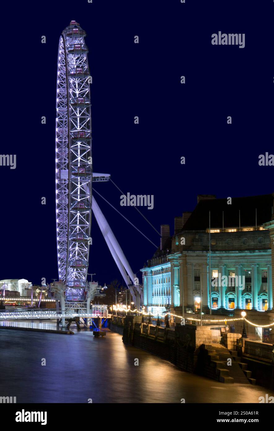 London Eye Southbank River Thames Westminster illuminé la nuit Banque D'Images