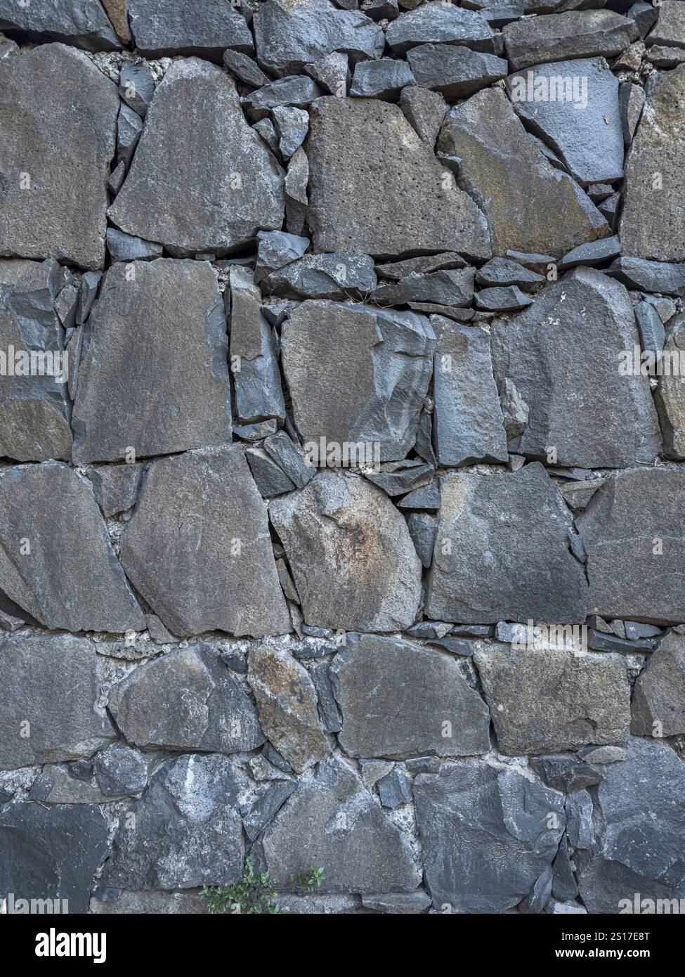 Texture d'un mur fait de pierres empilées Banque D'Images