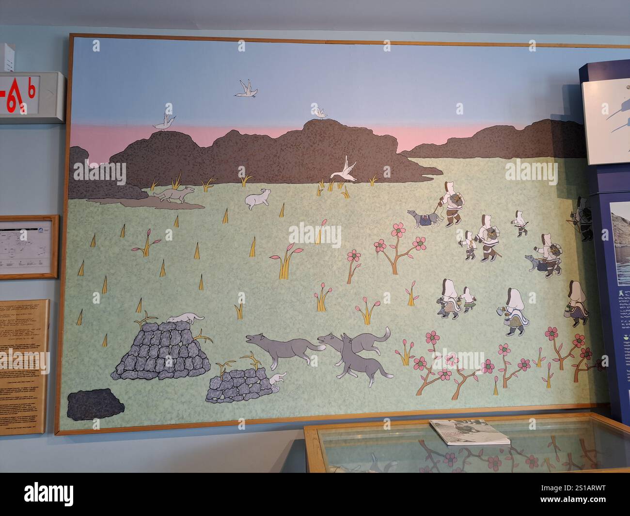 Peinture de chasse inuite au Centre des visiteurs Unikkaarvik sur la rue Sinaa à Iqaluit, Nunavut, Canada Banque D'Images