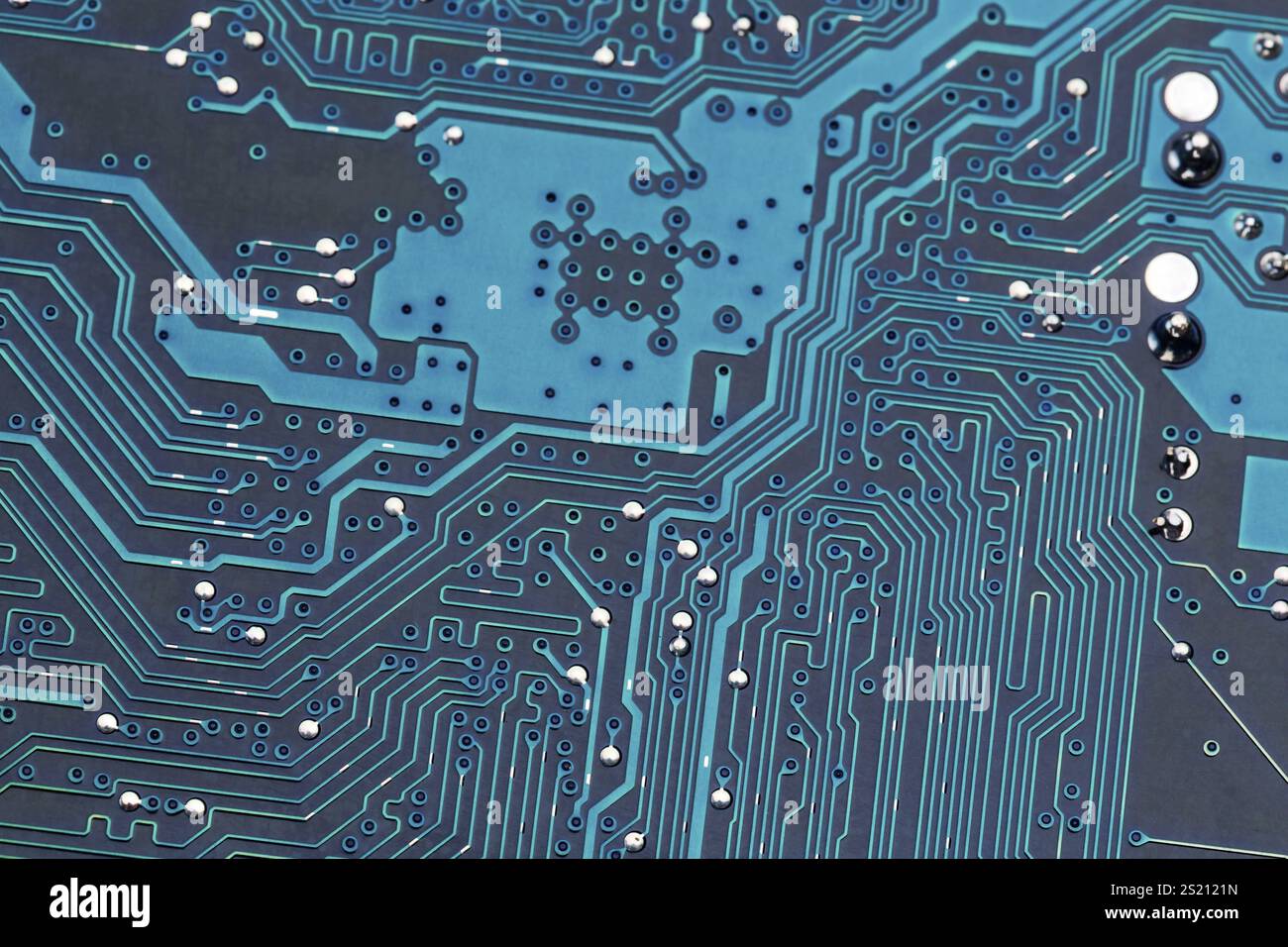 Gros plan d'une carte de circuit imprimé d'ordinateur. Photo symbolique pour la communication moderne Banque D'Images