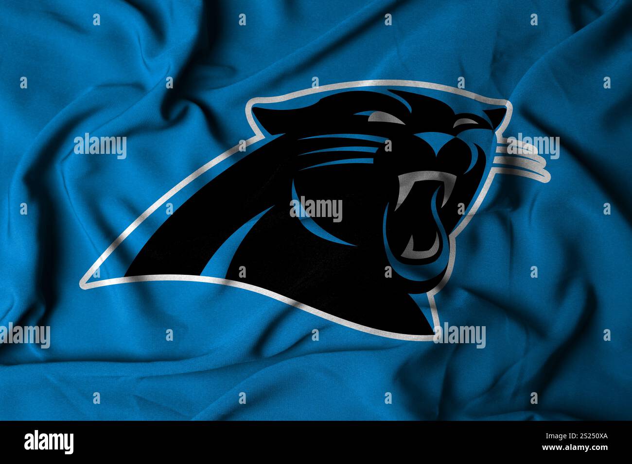 Pringsewu, Lampung ; 05 janvier 2025 ; texture d'un drapeau ondulant avec le logo de l'équipe de football américain NFL Carolina Panthers, États-Unis. 3D. Banque D'Images