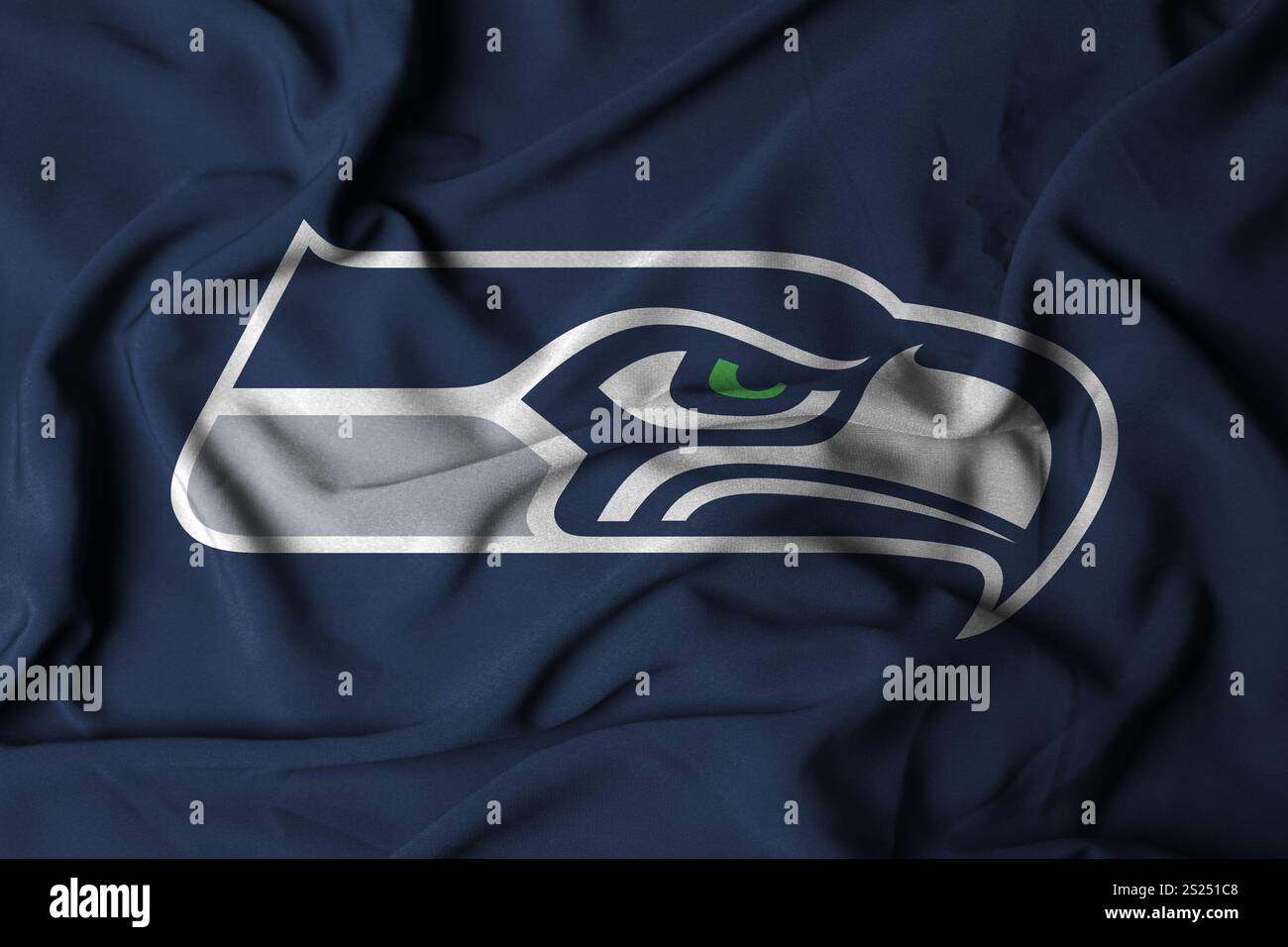 Pringsewu, Lampung ; 05 janvier 2025 ; texture d'un drapeau ondulant avec le logo de l'équipe de football américain NFL Seattle Seahawks, États-Unis. 3D ill Banque D'Images