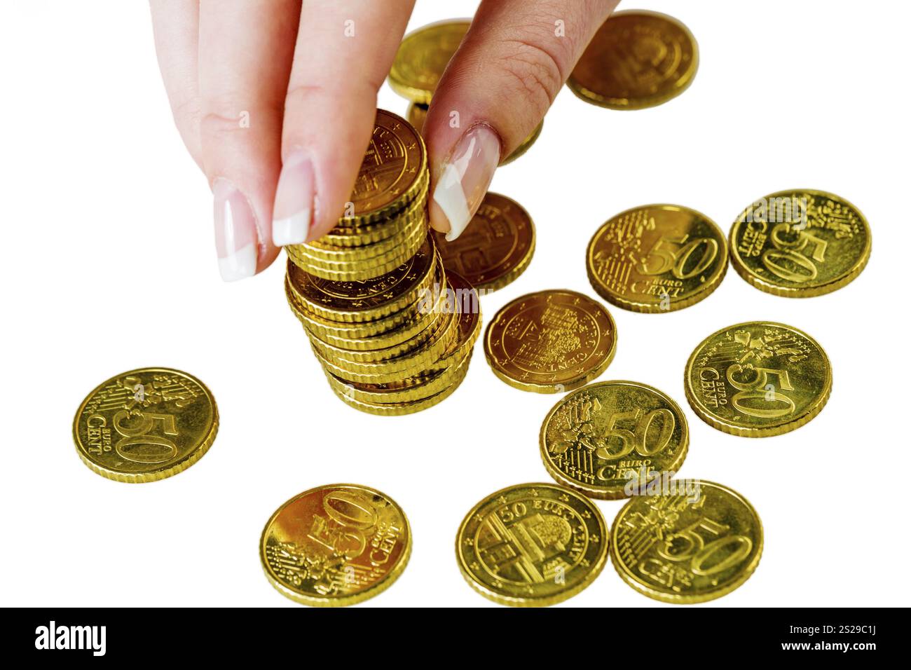 Une femme empile des pièces de monnaie. Économiser de l'argent pour l'avenir. Autriche Banque D'Images