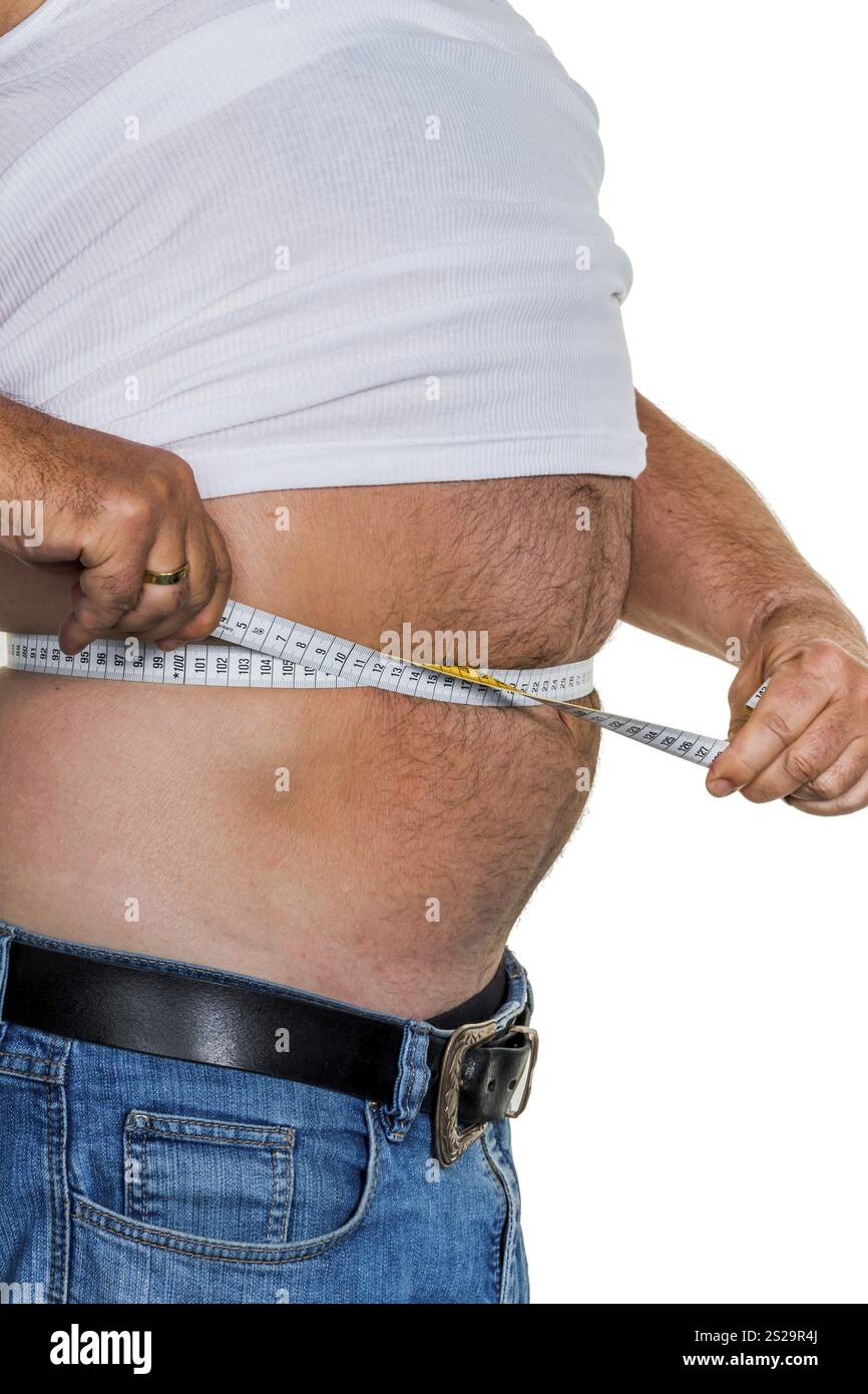 Homme avec excès de poids. Photo symbolique d'un ventre de bière, de régimes alimentaires infructueux et d'une mauvaise nutrition. Autriche Banque D'Images