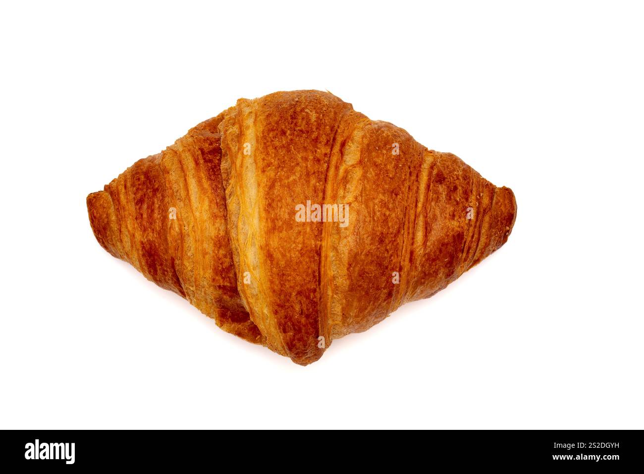 Croissant de beurre doré isolé sur fond blanc Banque D'Images