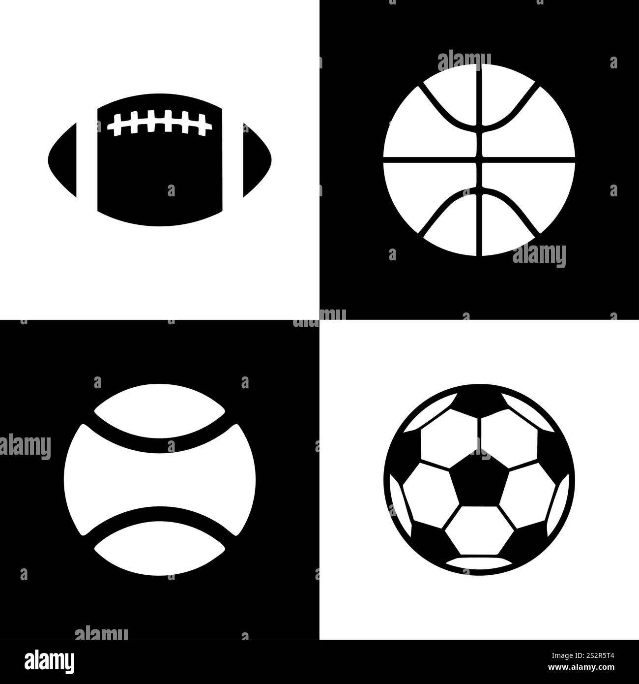 Balles de sport noires et blanches pour le développement de bébé Banque D'Images