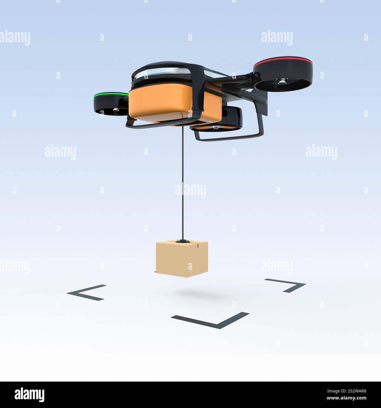 Drone hybride planant laisse tomber un paquet en carton Banque D'Images