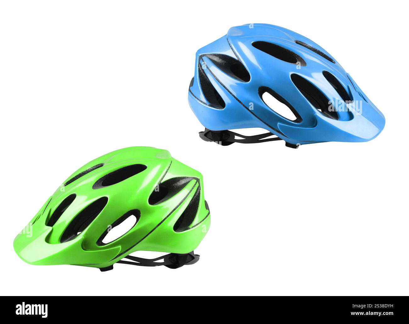 Casques de vélo verts et bleus sur fond blanc. Casques de vélo verts et bleus Banque D'Images