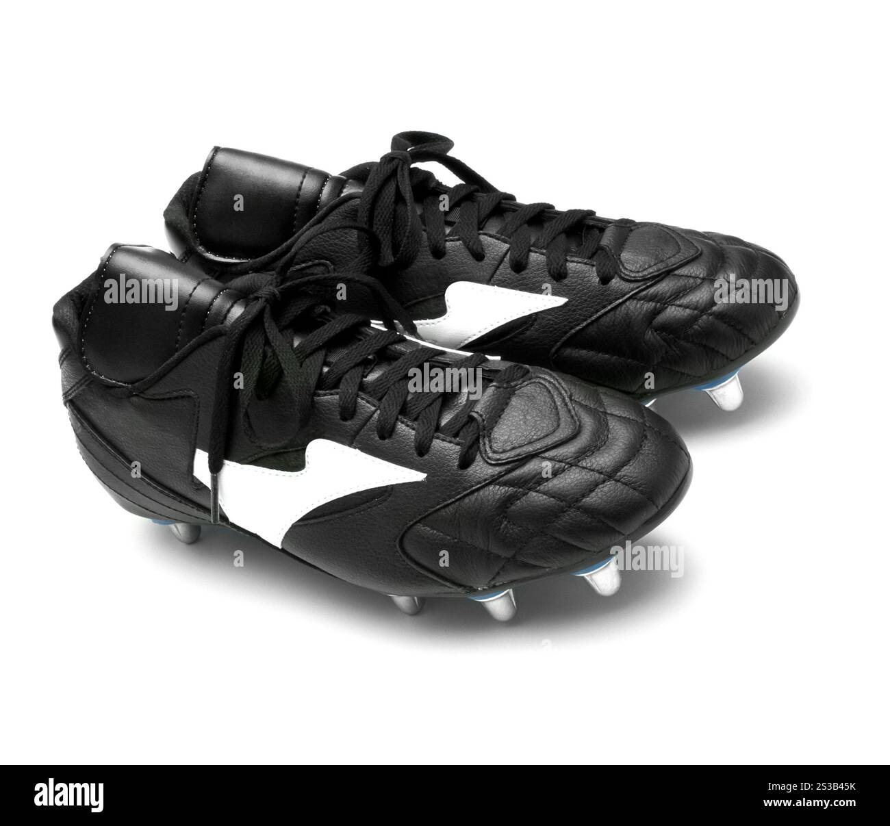 Chaussures de football isolées sur blanc. Chaussures de football Banque D'Images