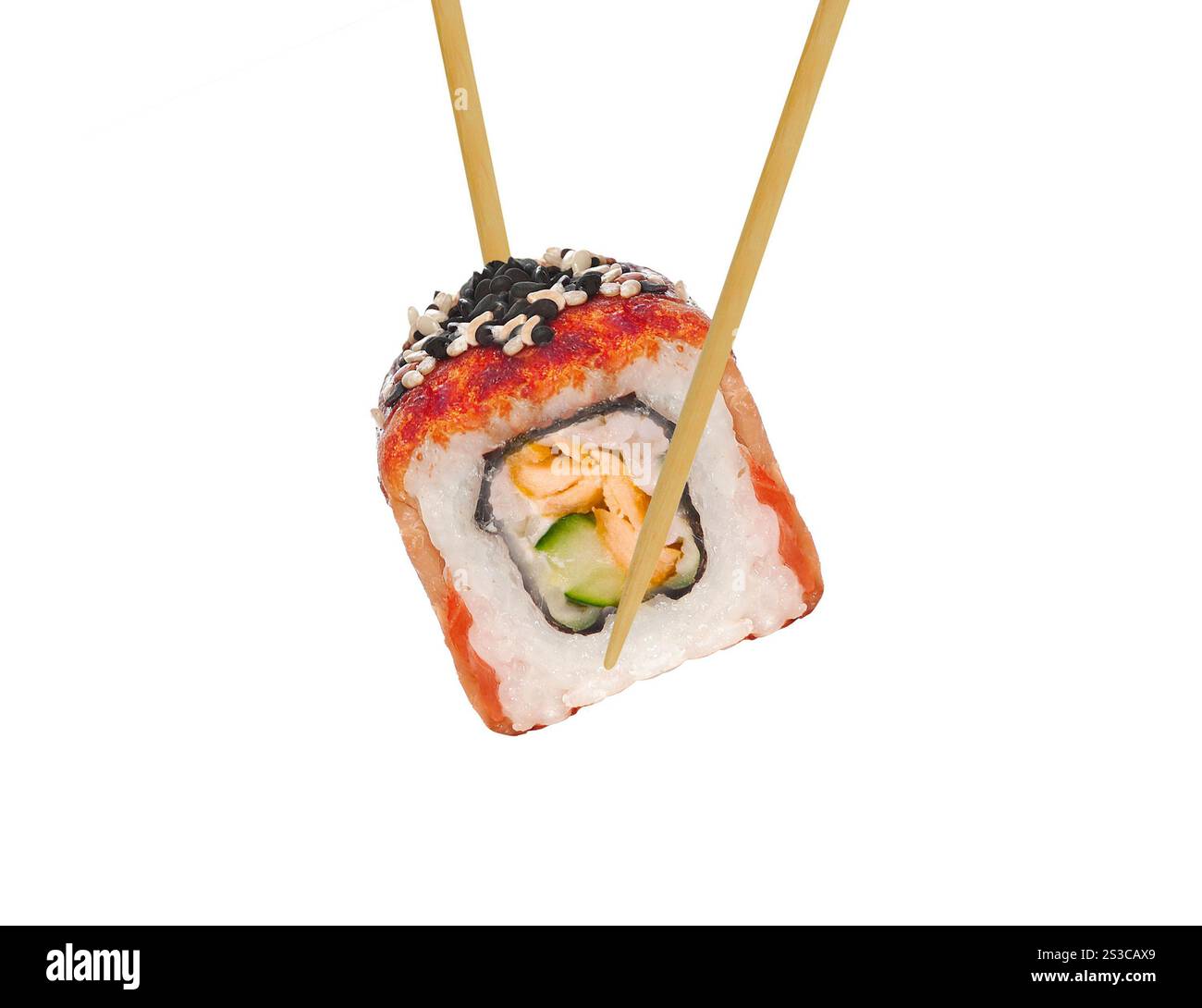 rouleau de sushi dans des baguettes Banque D'Images