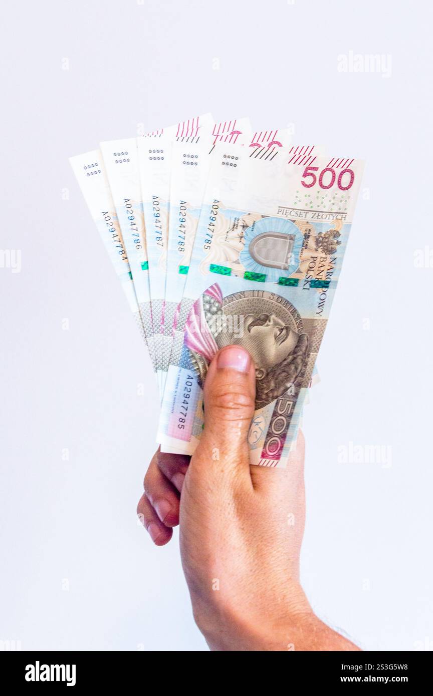 5 cinq cents billets polonais dans la main. Factures avec le portrait de Jan III Sobieski. Banque D'Images