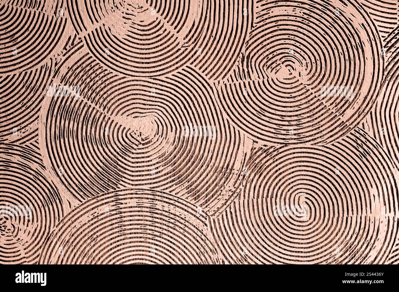Motifs complexes en spirale et en cercle en plâtre moka-mousse, parfaits pour la décoration murale d'accent. Banque D'Images