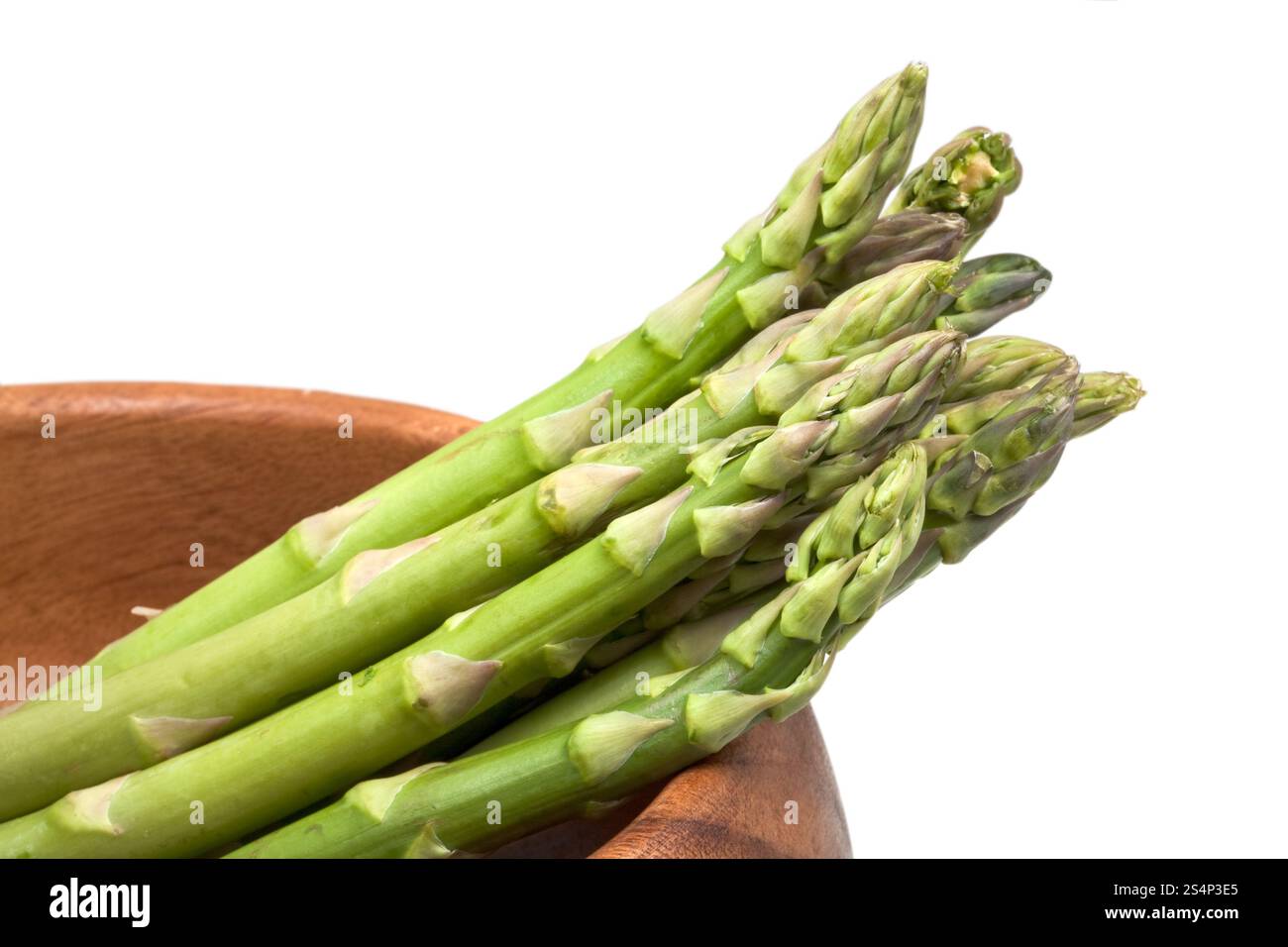 Les asperges vertes fraîches à bol en bois Banque D'Images