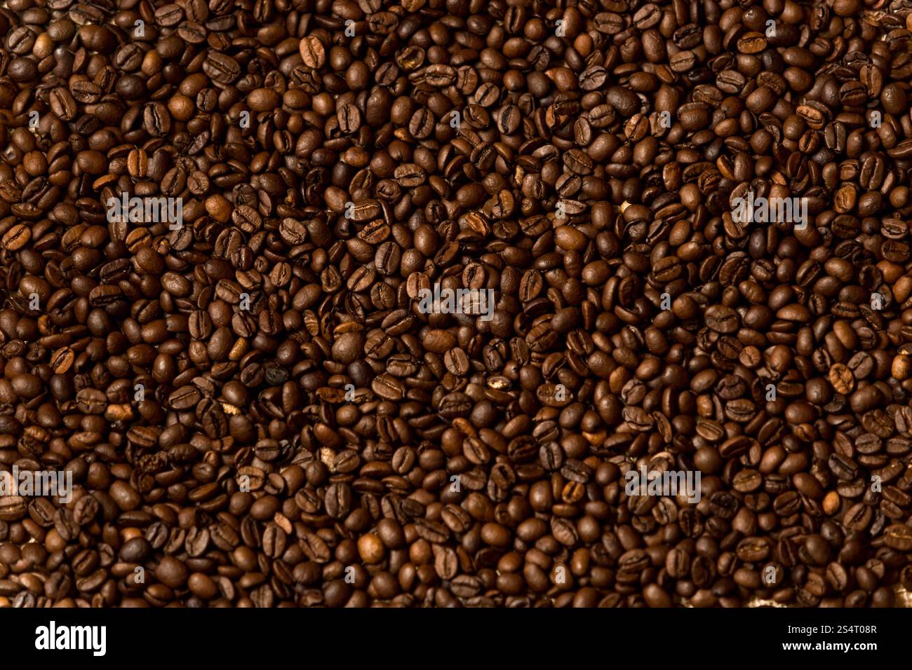 La texture des grains de café torréfié noir Banque D'Images