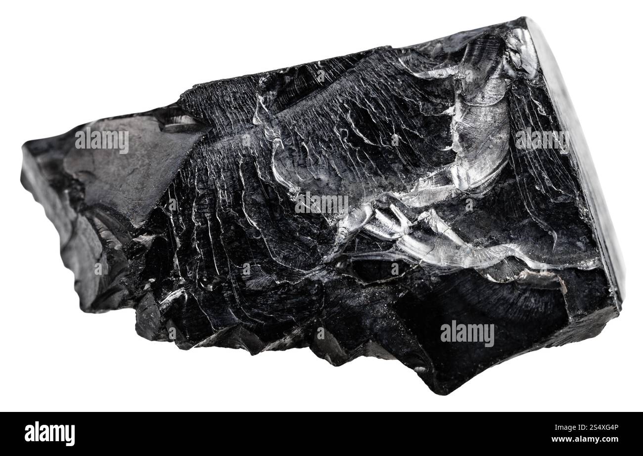 La prise de vue macro de matières premières minérales naturelles - Pierre Pierre shungite isolé sur fond blanc Banque D'Images
