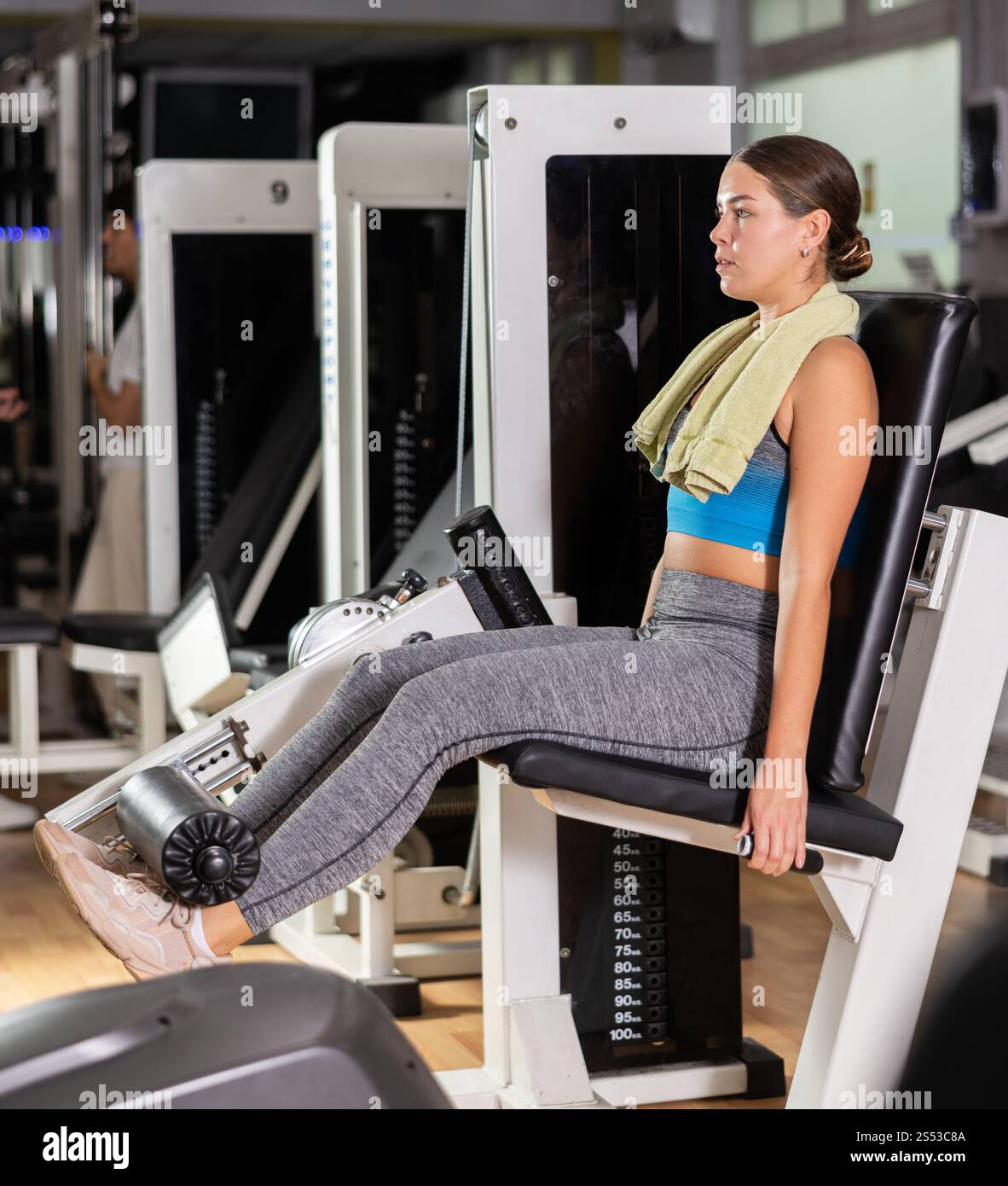 Femme faisant des exercices de quadriceps Banque D'Images