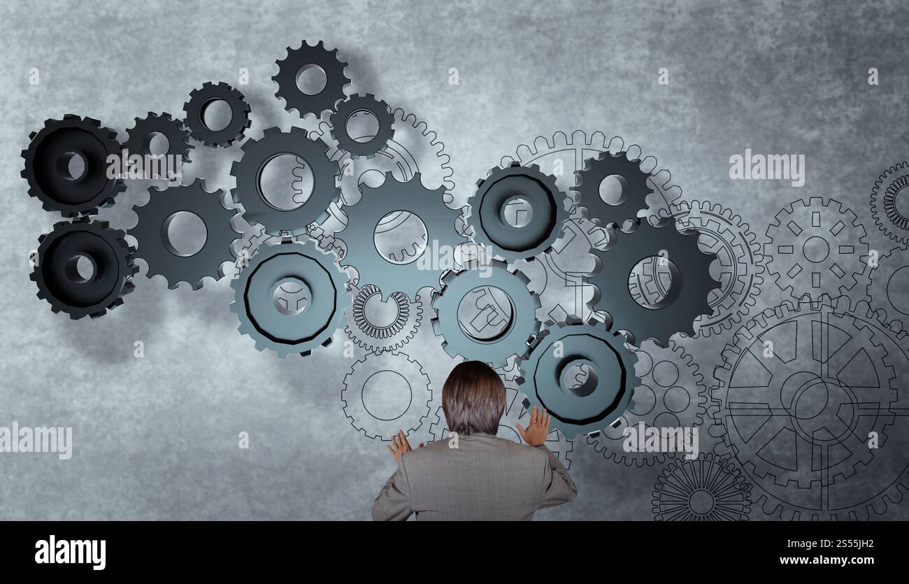 Businessman working avec pignon à succès comme concept Banque D'Images
