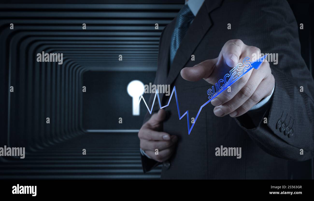 Main d'homme d'affaires avec la clé du succès comme concept Banque D'Images
