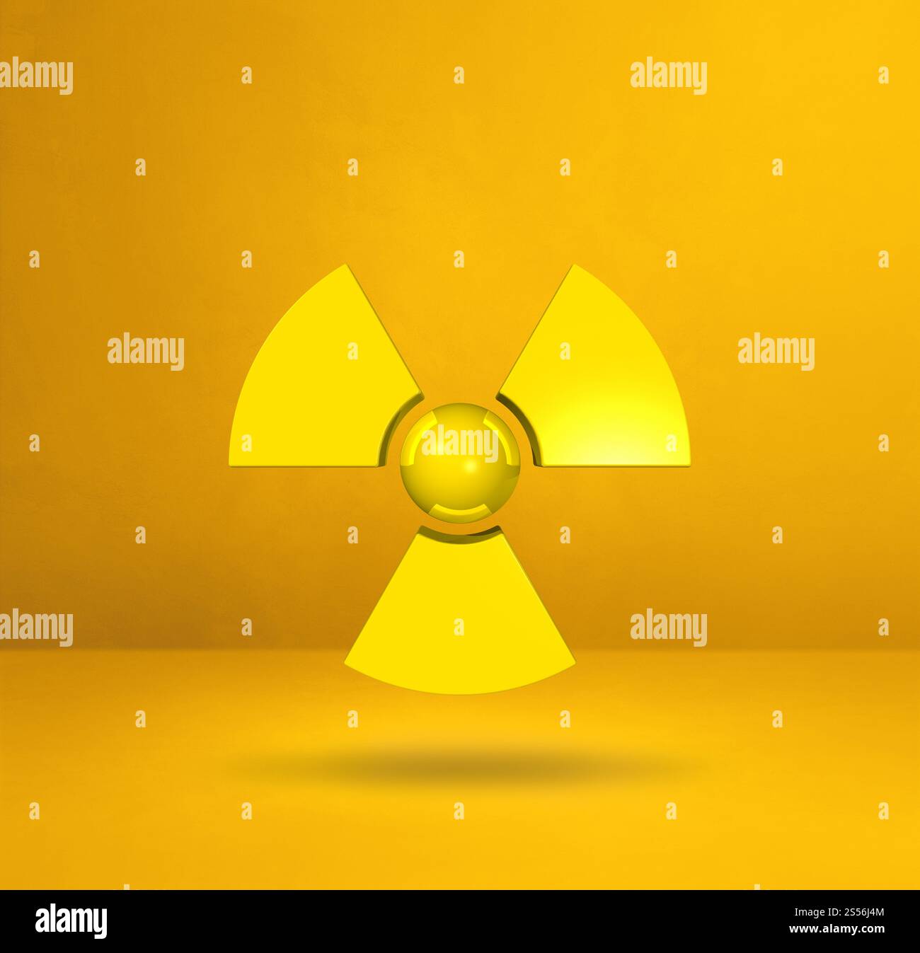 Symbole radioactif isolé sur un fond jaune de studio. Illustration 3D. Symbole radioactif sur un fond jaune de studio Banque D'Images