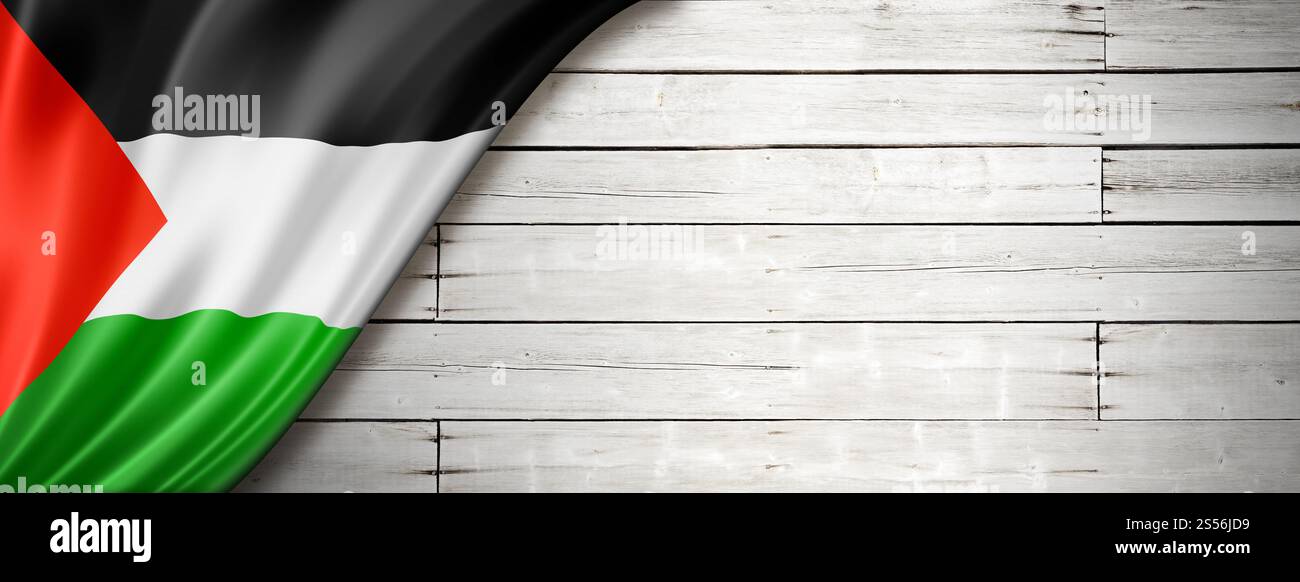 Drapeau palestinien sur vieux mur blanc. Bannière panoramique horizontale. Drapeau palestinien sur la vieille bannière murale blanche Banque D'Images