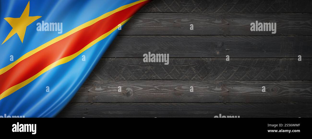 Drapeau de la République démocratique du Congo sur un mur de bois noir. Bannière panoramique horizontale. Drapeau de la République démocratique du Congo sur la bannière murale en bois noir Banque D'Images
