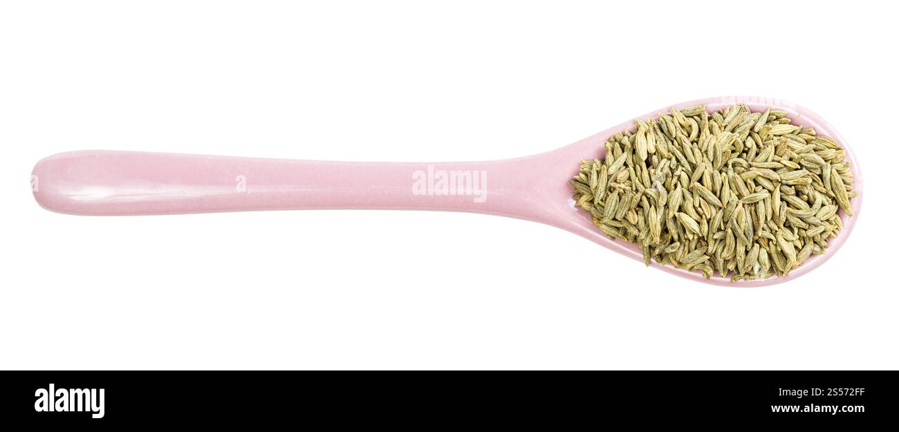 vue de dessus de la cuillère en céramique avec graines d'anis isolées dessus arrière-plan blanc Banque D'Images