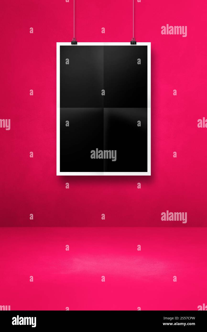 Affiche pliée noire accrochée sur un mur rose avec des clips. Modèle de maquette vierge. Affiche pliée noire accrochée sur un mur rose avec des clips Banque D'Images