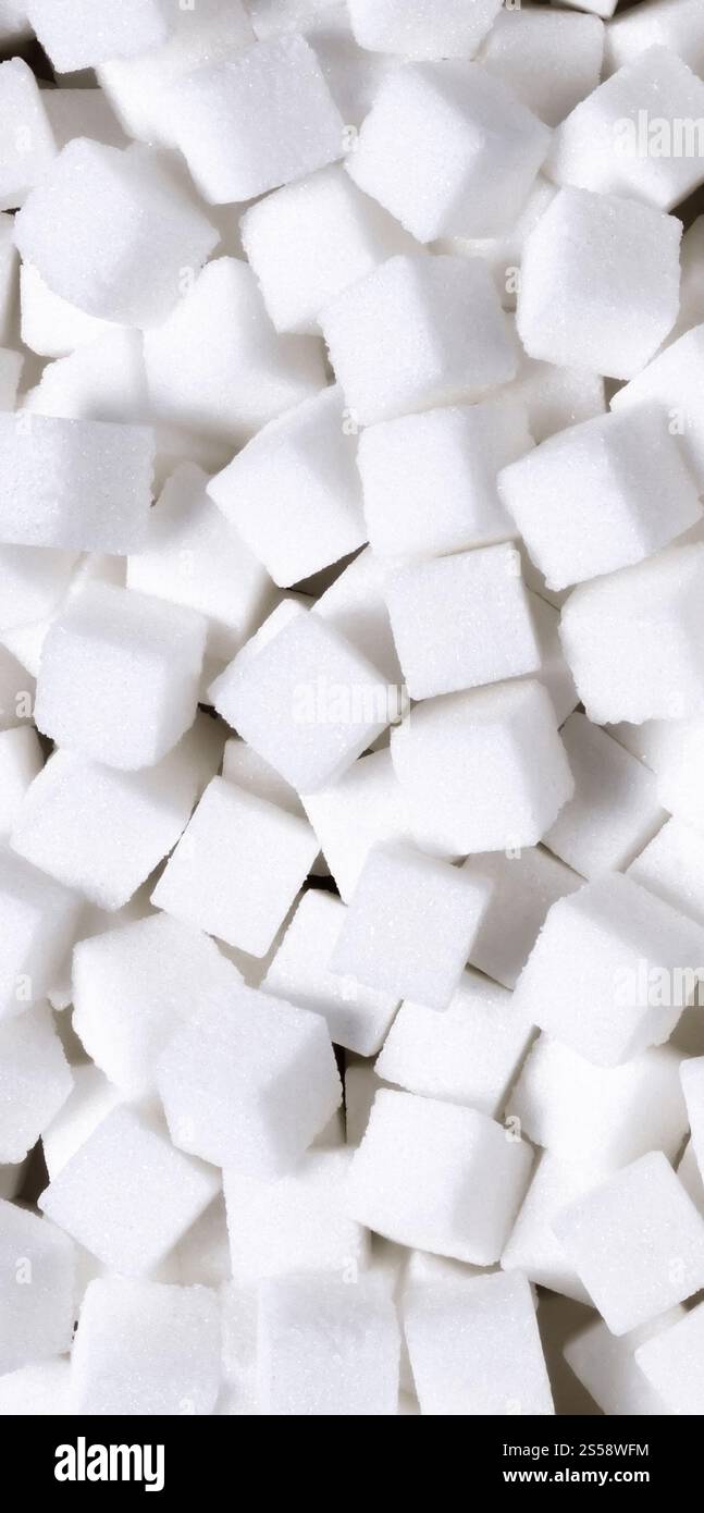 sucre blanc dans le fond de texture de cubes. sucre blanc en cubes Banque D'Images