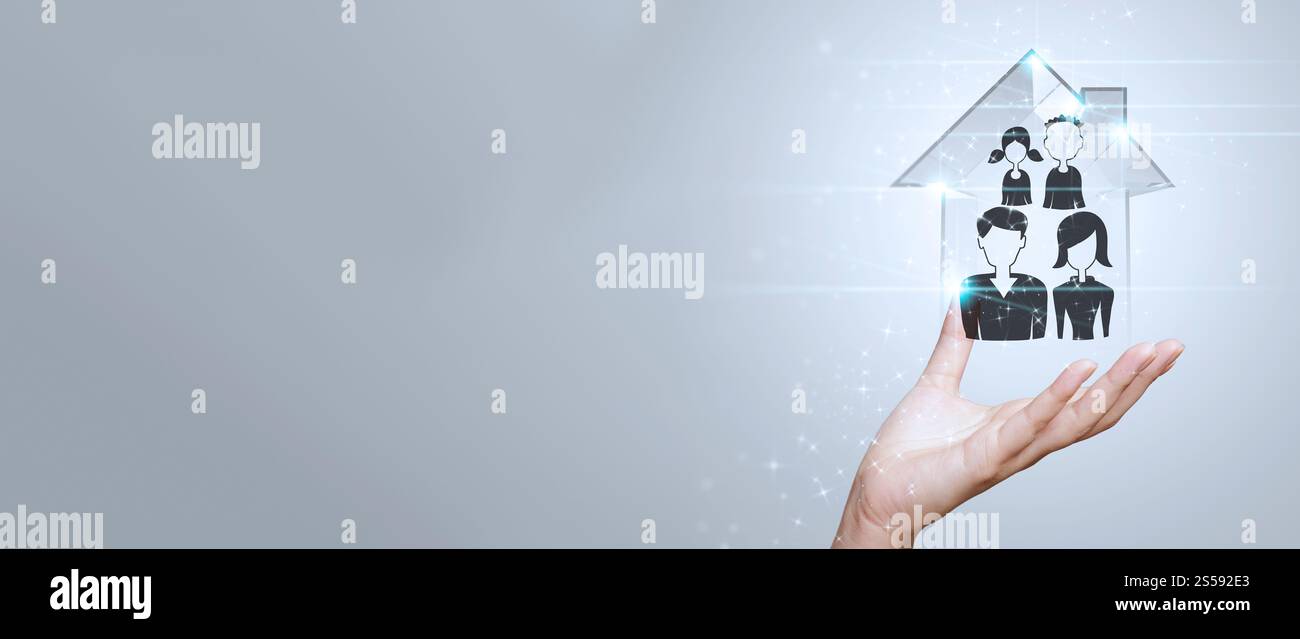 homme d'affaires tenant une maison en 3d avec une icône de famille sur fond gris comme concept d'assurance d'innovation. Banque D'Images
