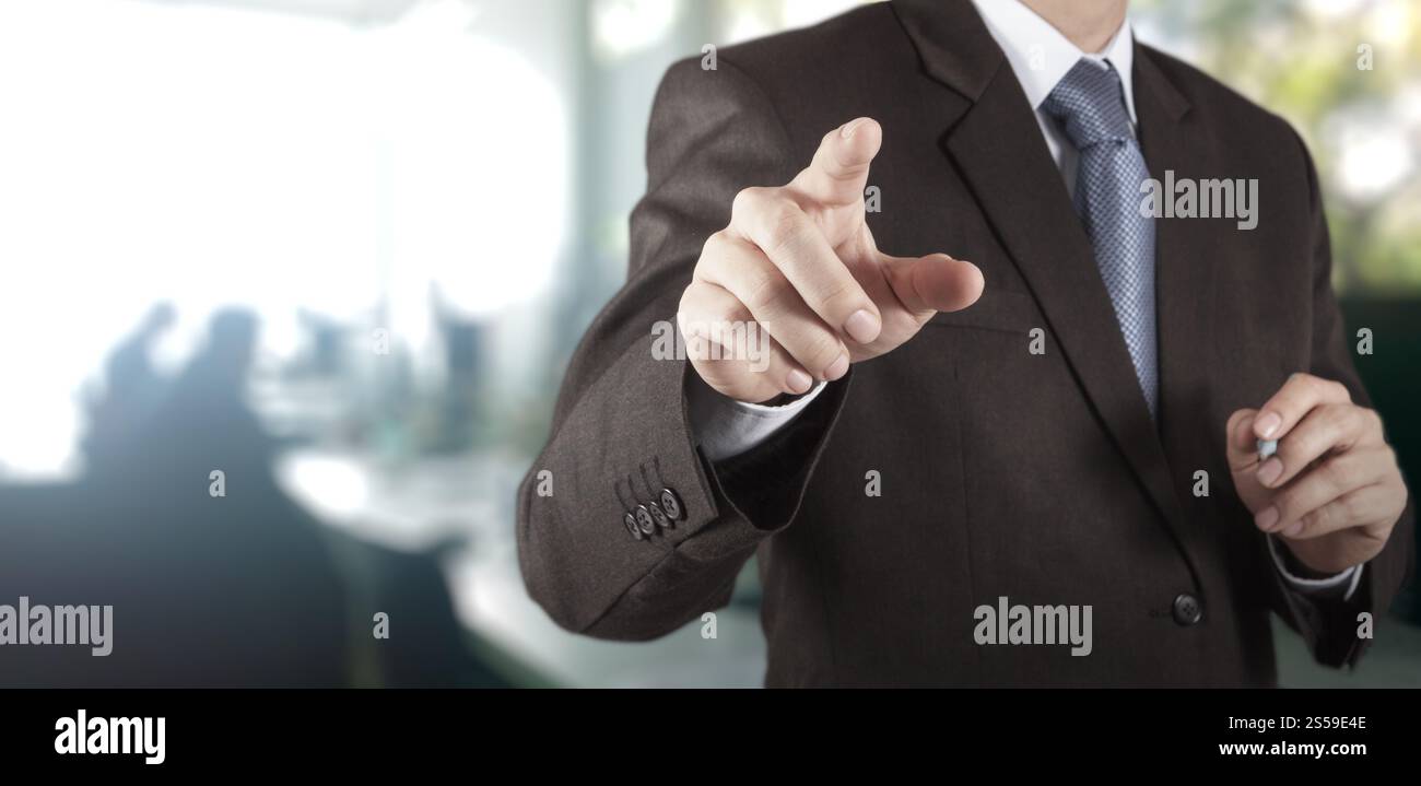 homme d'affaires travaillant avec son fond de bureau comme concept Banque D'Images