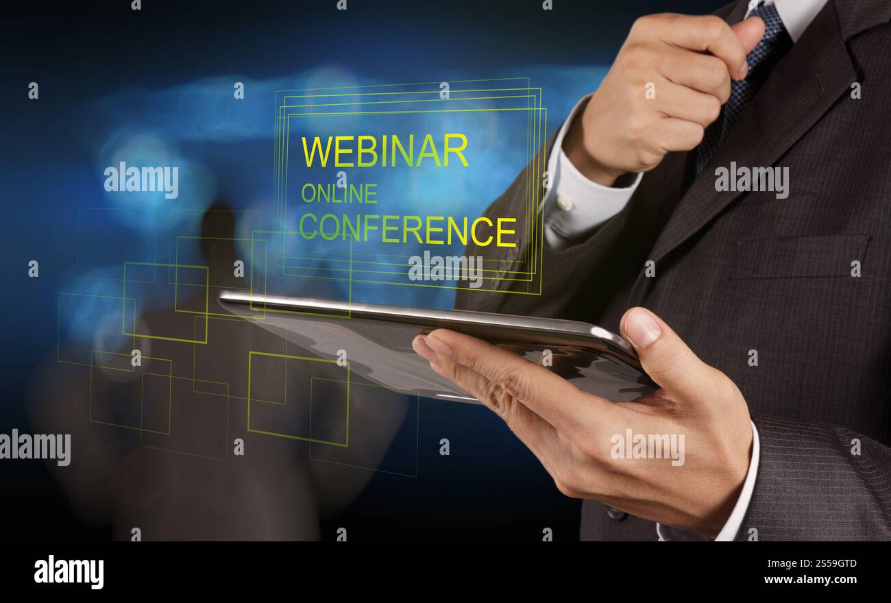 Businessman hand afficher en ligne webinaire conférence en tant que concept Banque D'Images