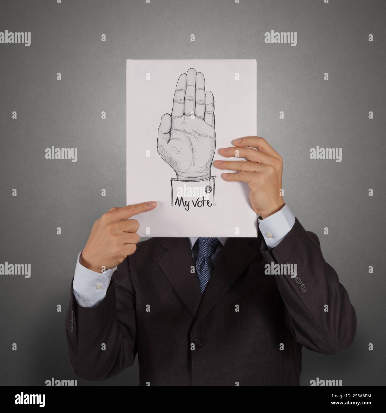 Homme d'affaires montrer le livre de la main soulevé avec MON texte DE VOTE comme concept Banque D'Images