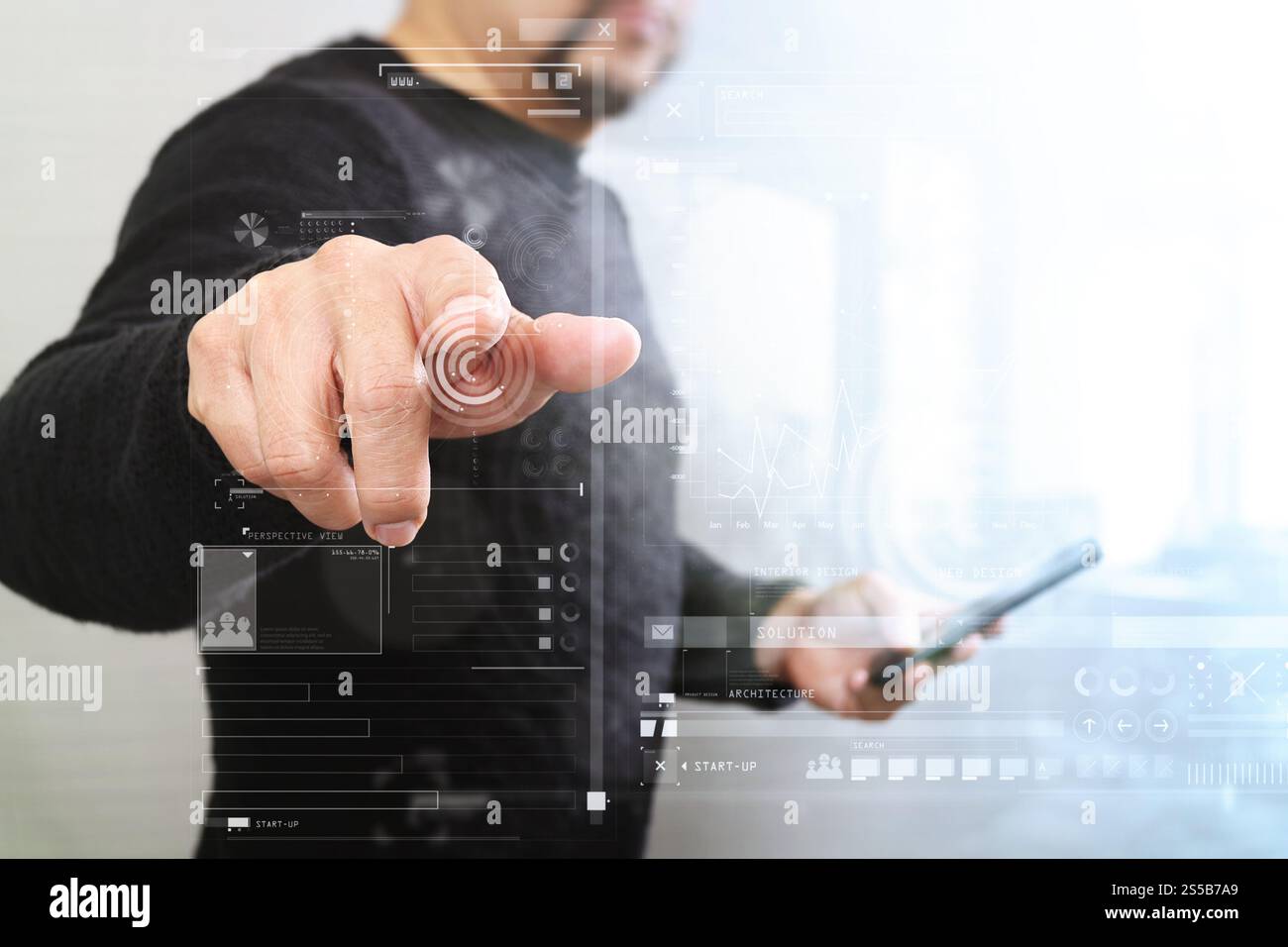 Businessman hand en appuyant sur un bouton imaginaire,holding smart phone,écran numérique virtuel graphique graphique,icônes,dessin Banque D'Images