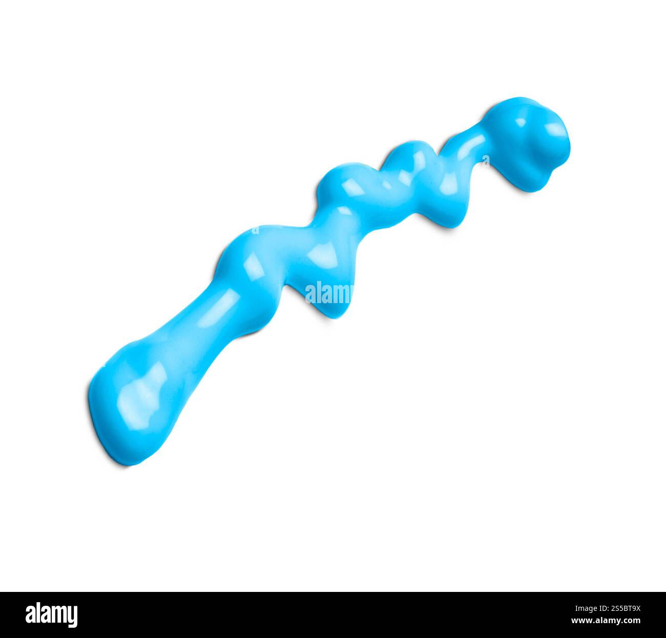 gouttes de peinture bleue isolées sur fond blanc. la peinture bleue coule sur blanc Banque D'Images