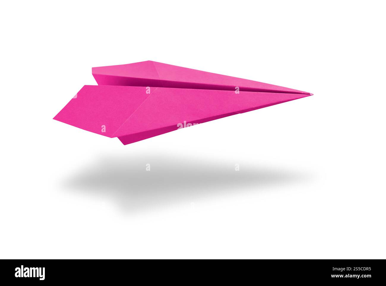 Origami avion en papier rose isolé sur un fond blanc vierge. Origami plan de papier rose isolé sur un fond blanc Banque D'Images