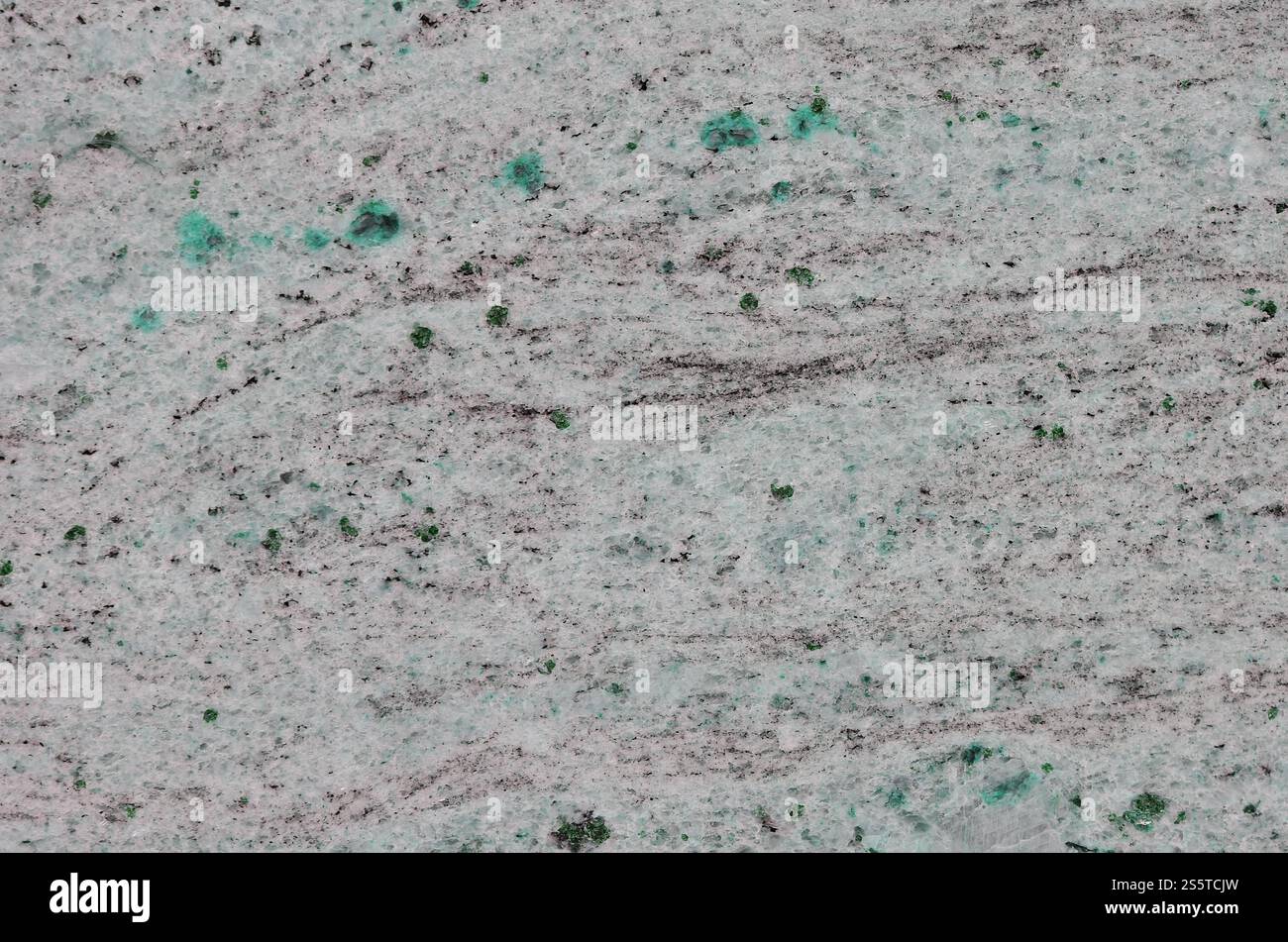 Texture d'une surface en marbre beige solide et glissante comme matériau pour décorer les murs à l'intérieur et la façade sous la forme de carreaux rectangulaires. Banque D'Images