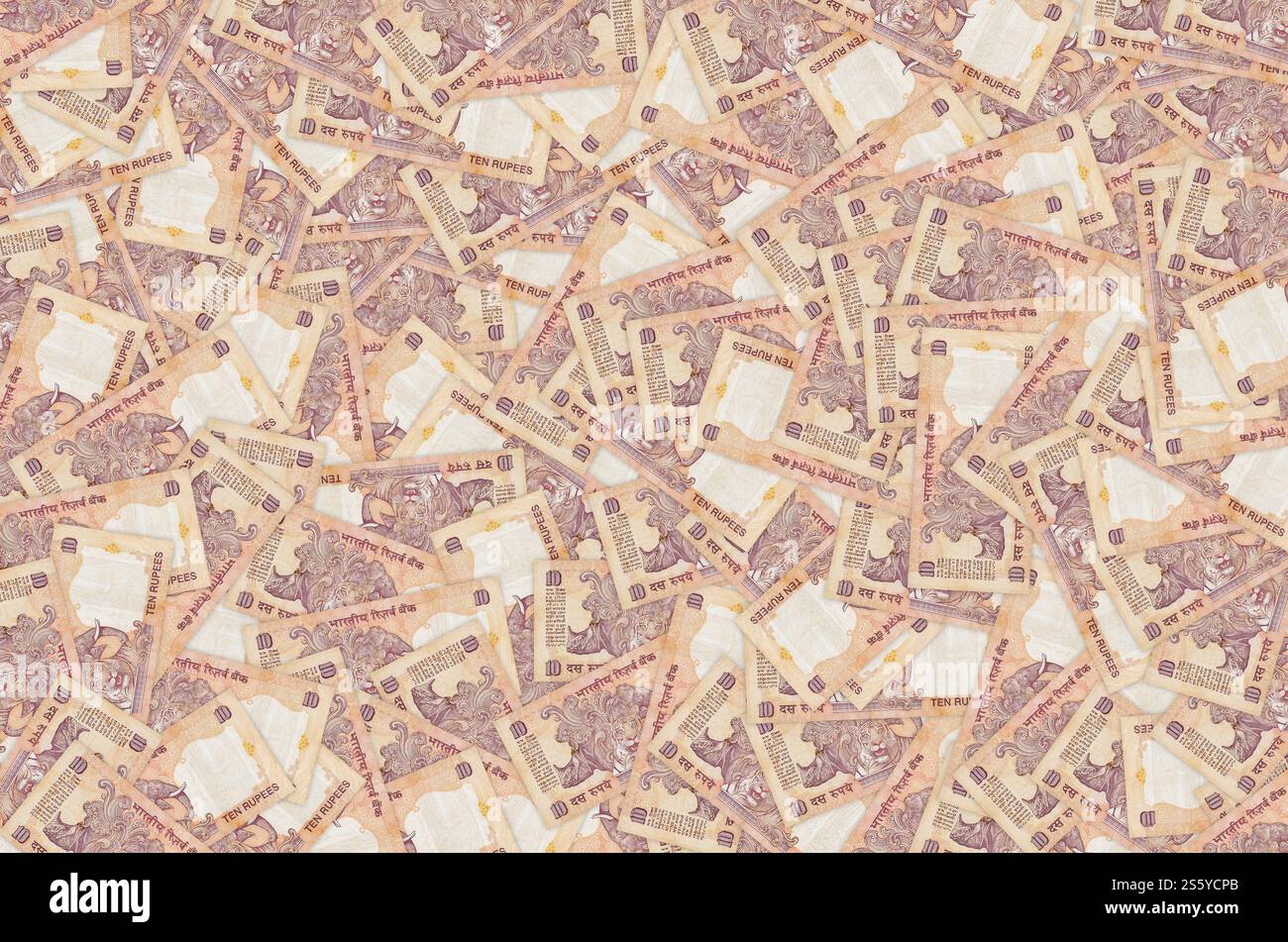 Éléphant rhinocéros et tigre représentés sur un billet de banque indien de dix roupies. 10 Roupie monnaie nationale de l'Inde INR. Gros plan sur la facture Orange Money. Éléphant Banque D'Images