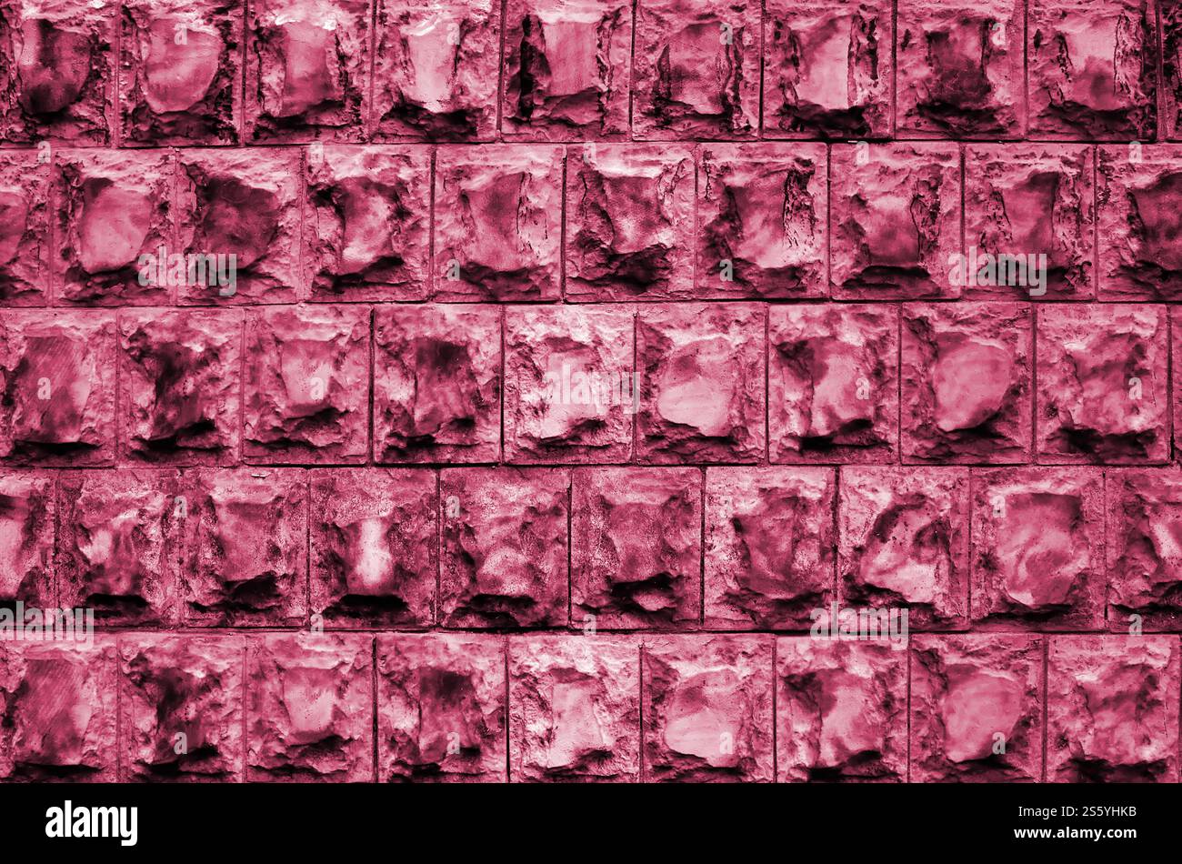 Conception de texture de la fondation ou des murs des bâtiments sous la forme de carreaux rectangulaires en pierre de granit solide avec des angles vifs. Image tonifiée Banque D'Images