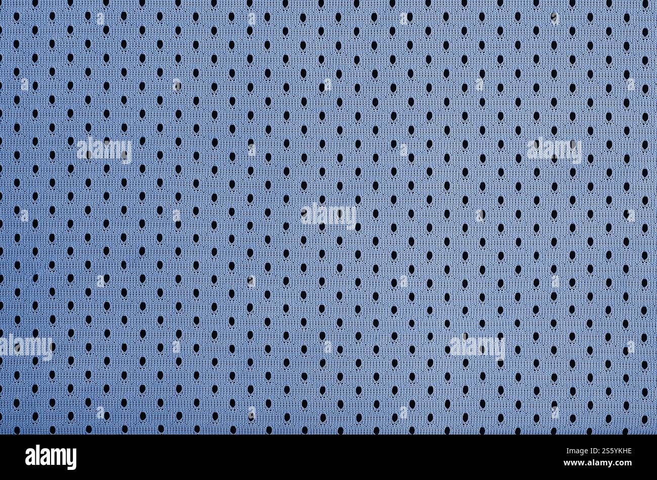 Fond de modèle textile de tissu de tissu de sport de maille bleu. Couleur bleue maillot de football vêtements tissu texture vêtements de sport. Porifère poreux respirant Banque D'Images