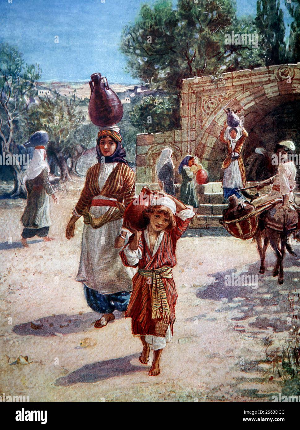 Plaque de couleur de l'enfant Jésus Christ aidant sa mère la Vierge Marie ramasser l'eau d'un puits à Nazareth (Luc) de la 1906-10 la vie de Banque D'Images