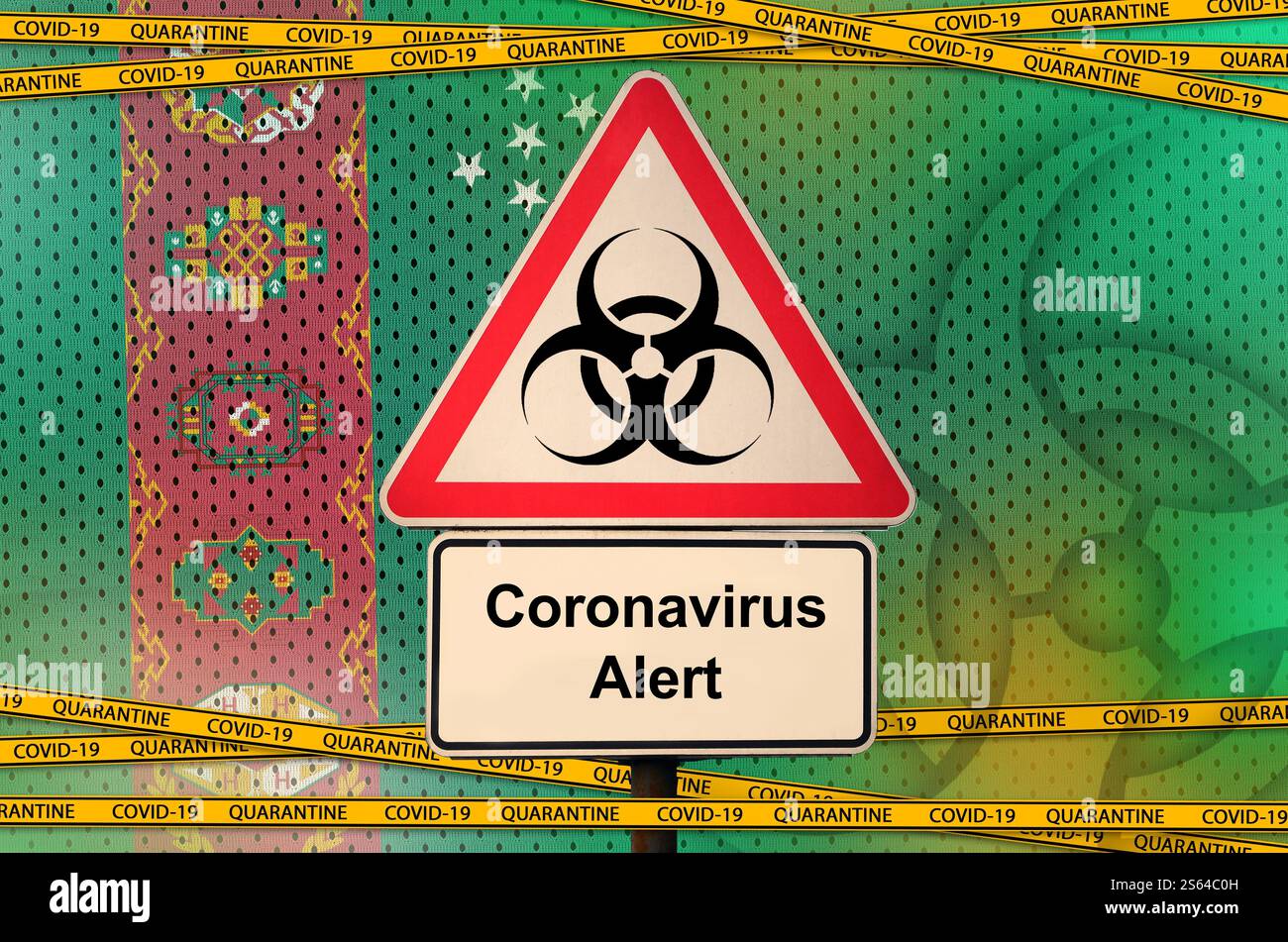 Drapeau du Turkménistan et symbole de danger biologique COVID-19 avec ruban orange de quarantaine. Concept de coronavirus ou virus pandémique 2019-nCoV. Drapeau du Turkménistan et Banque D'Images
