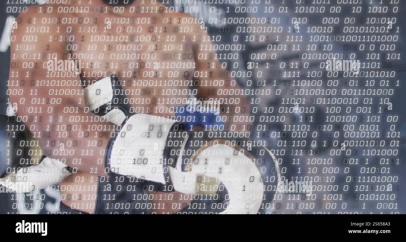 Image du traitement des données sur un boxeur masculin biracial préparant des gants au gymnase Banque D'Images