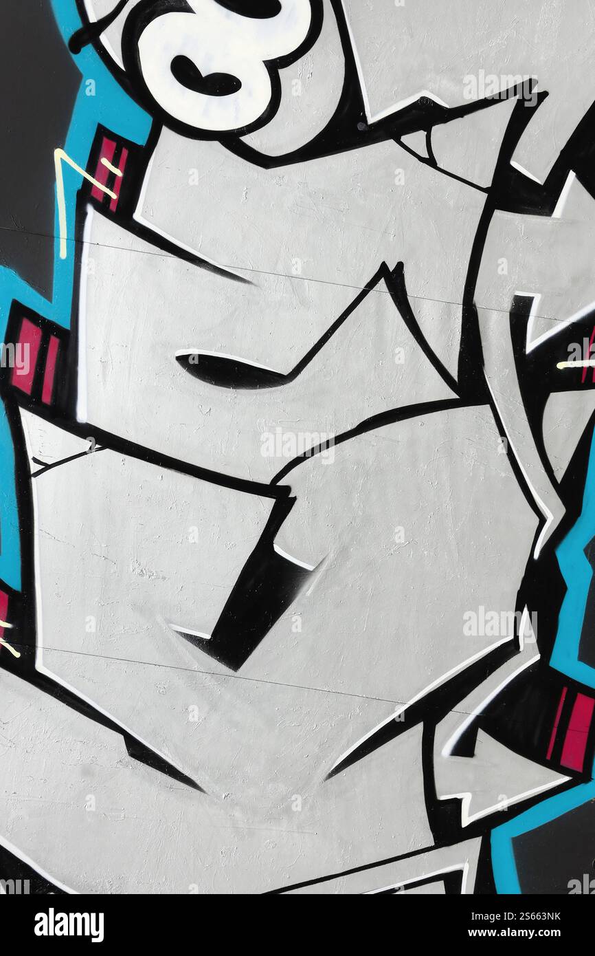 Fond coloré de graffiti peinture d'art avec des bandes d'aérosol brillantes sur le mur en métal. Pièce d'art de rue Old School faite avec de la peinture en aérosol Banque D'Images