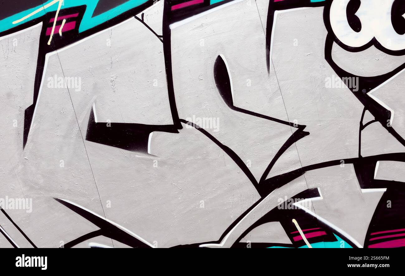 Fond coloré de graffiti peinture d'art avec des bandes d'aérosol brillantes sur le mur en métal. Pièce d'art de rue Old School faite avec de la peinture en aérosol Banque D'Images