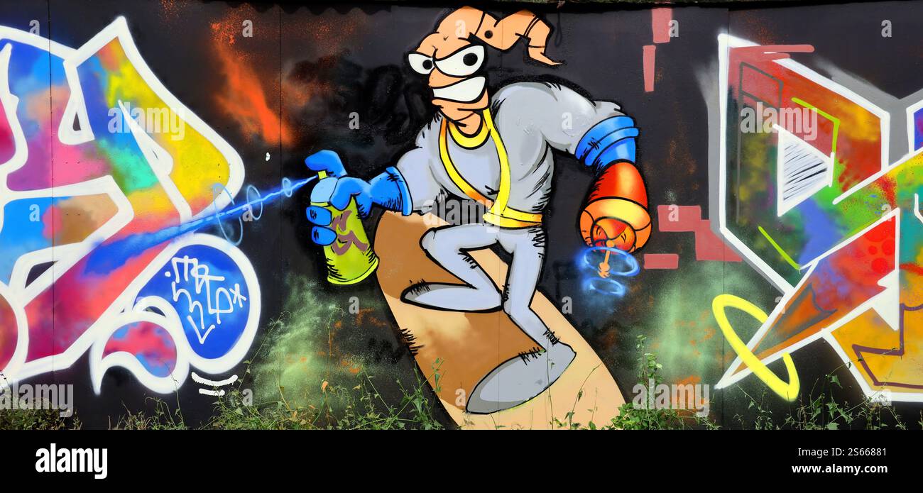 Fond coloré de graffiti peinture d'art avec des bandes d'aérosol brillantes sur le mur en métal. Pièce d'art de rue Old School faite avec de la peinture en aérosol Banque D'Images