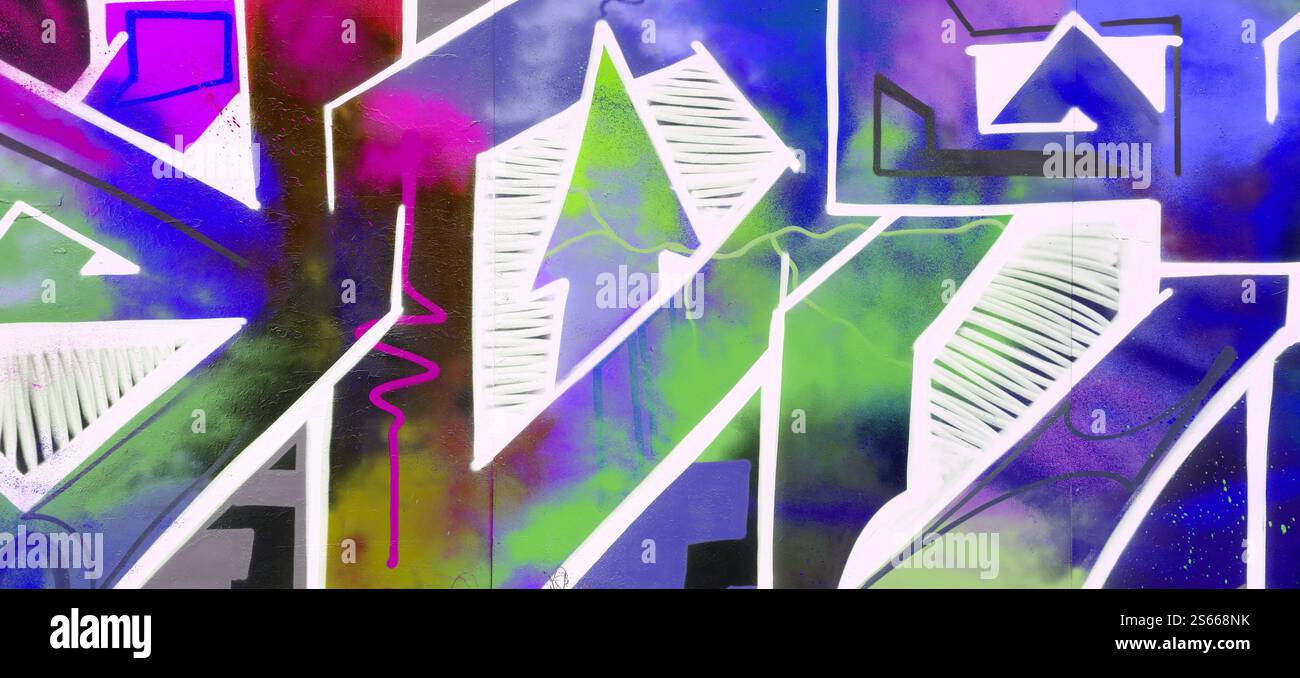 Fond coloré de graffiti peinture d'art avec des bandes d'aérosol brillantes sur le mur en métal. Pièce d'art de rue Old School faite avec de la peinture en aérosol Banque D'Images