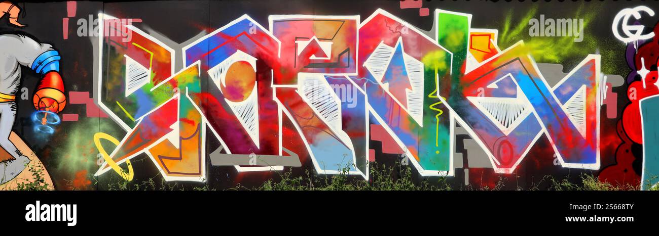 Fond coloré de graffiti peinture d'art avec des bandes d'aérosol brillantes sur le mur en métal. Pièce d'art de rue Old School faite avec de la peinture en aérosol Banque D'Images